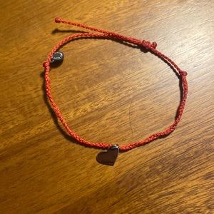Red Puravida bracelet with heart charm